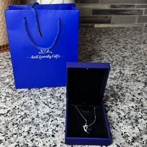 Brand New! Silver Necklace with Purple Pendant